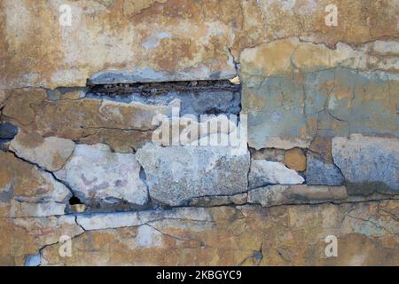 Wall from concrete slabs in cracks after the earthquake Stock Photo