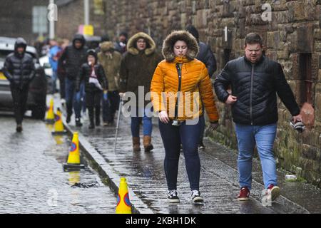 Fans arrive at the ground as Storm Dennis hits the UK ahead of the Scottish Premier League match between Hearts and Hamilton at Tynecastle park on 15 February, 2020 in Edinburgh, Scotland. (Photo by Ewan Bootman/NurPhoto) Stock Photo
