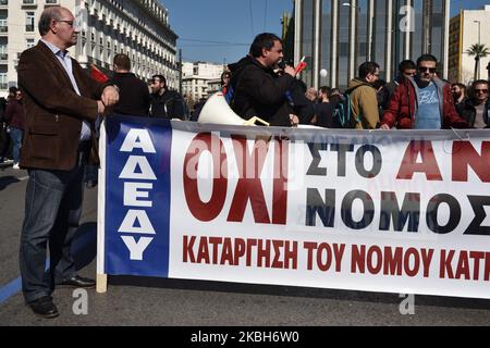 Workers participating in the 24-hour general strike against the pension system reform bill submitted by the government to the Greek Parliament march in central Athens, on February 18, 2020 (Photo by Nicolas Koutsokostas/NurPhoto) Stock Photo