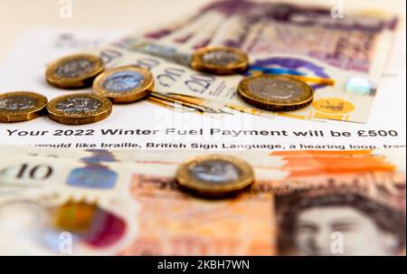 The UK government winter fuel payment to help households cope with the cost of living crisis of surging energy cost. Stock Photo