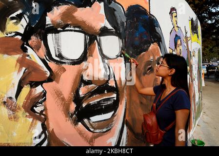 Bangladeshi art students paint street hi-res stock photography and