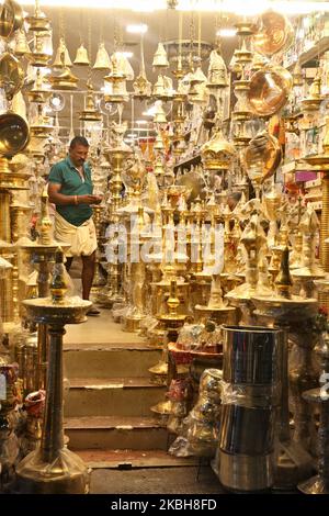Shop selling brass lamps and pooja items (items used in Hindu prayers) in Thiruvananthapuram (Trivandrum), Kerala, India. (Photo by Creative Touch Imaging Ltd./NurPhoto) Stock Photo