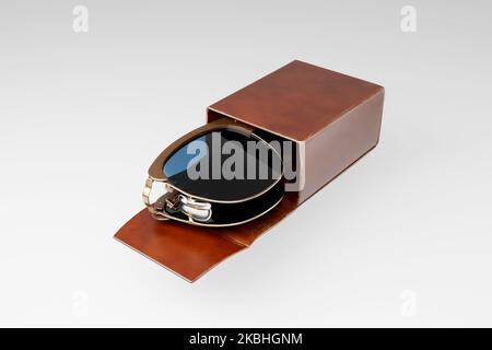 Folding Vintage Sunglasses with Leather Case 3d render. Stock Photo