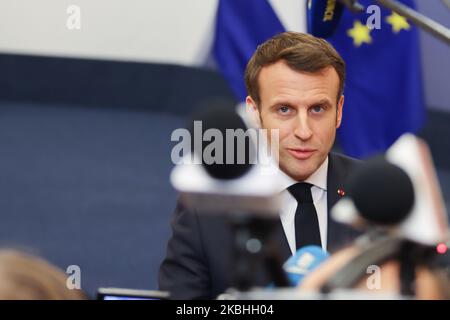 Emmanuel Macron President of France has a doorstep media briefing, press statement and talks with journalists after the end of the second day of intense negotiations on the EU long term budget for 2021-2027 at a special European Council EUCO, EURO summit, EU leaders meeting in Brussels, Belgium. February 21, 2020 (Photo by Nicolas Economou/NurPhoto) Stock Photo