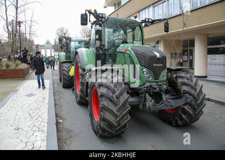 Farmers and European milk producers gather during a rally with the support of 150 tractors, they protest in front of the EU Headquarters around Schumanplein ahead and during of a special European Council summit, meeting of EU leaders on February 20, 2020 in Brussels, Belgium. The demonstration of the farmers in the capital of Belgium, Brussels is supported by the Wallon agricultural federation FWA, the Federation des Jeunes Agriculteurs and also the Flemish delegations of the Boerenbond, the General Farmer's Syndicate ABS and the young farmers of the Groene Kring. Farmers don't agree on the ne Stock Photo