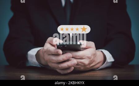 Customer satisfaction and five star rating shown with laptop ...