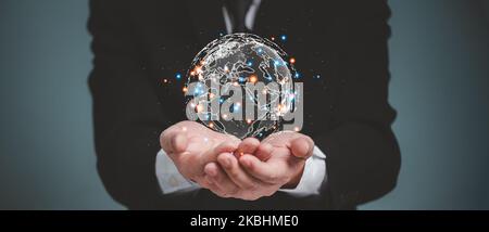 Businessman holding Global network connection. Digital Future communication global network technology concept. Stock Photo