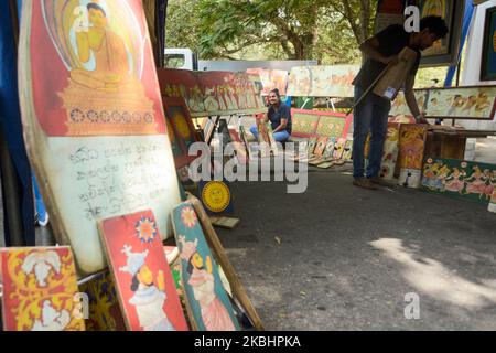 A Sri Lankan artist displays his artwork at the annual 'Kala Pola' Art Festival in Colombo, Sri Lanka on 23 February.2020 The Annual Kala Pola Festival features over 250 artists and sculptors from all parts of Sri Lanka. (Photo by Akila Jayawardana/NurPhoto) Stock Photo