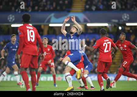 Azpilicueta (Chelsea) and Thiago (Bayern Munich) battle for the ball during the 2019/20 UEFA Champions League 1/8 playoff finale game between Chelsea FC (England) and Bayern Munich (Germany) at Stamford Bridge. (Photo by Federico Guerra Moran/NurPhoto) Stock Photo