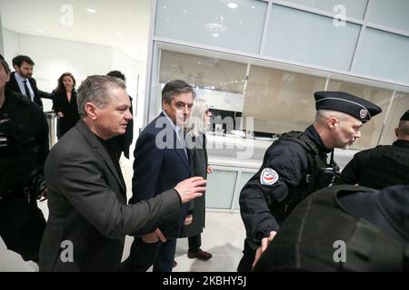Former French Prime minister Francois Fillon and his wife Penelope arrive at Paris' courthouse, on February 26, 2020, for the opening hearing of their trial over claims they embezzled over one million euros in an alleged fake-jobs fraud. Investigators suspect that Fillon, 65, hired his Welsh-born wife Penelope as his parliamentary assistant between 1998 and 2013, without having her do any actual work. (Photo by Michel Stoupak/NurPhoto) Stock Photo