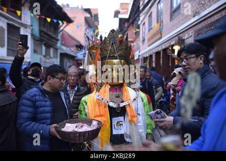 Nepalese Buddhist devotee carry a statue of Dipankar Buddha during a ritual procession of the Samyak Mahadan festival in Lalitpur, Nepal on Thursday, February 27, 2020. Once in five years total number of 126 Dipankar Buddha from different places gathered in Lalitpur for ritual procession. (Photo by Narayan Maharjan/NurPhoto) Stock Photo