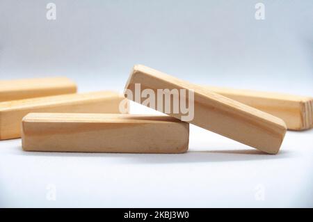 Wooden blocks on white cover background with customizable space for text or ideas. Copy space. Stock Photo