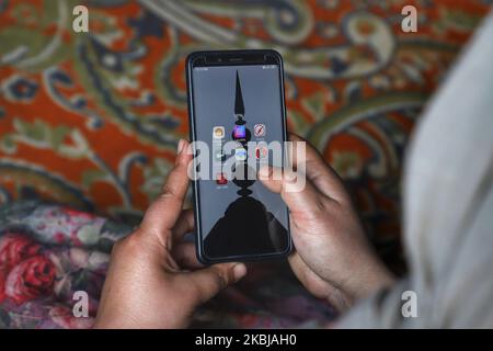 A user shows multiple Virtual private networks (VPNs) installed on his phone in Srinagar, Jammu And Kashmir, India on 28 February 2020. Kashmiris use VPNs to access social media despite prison threat. Mobile operators create firewalls, block all VPNs in Kashmir (Photo by Nasir Kachroo/NurPhoto) Stock Photo
