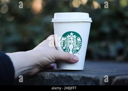 Starbucks Coffee logo is seen on disposable paper cup is seen in this illustration photo taken in Prague, Czech Republic on March 1, 2020. (Photo by Jakub Porzycki/NurPhoto) Stock Photo