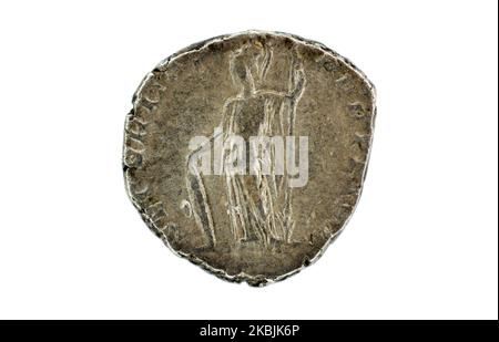 Reverse of a Roman Caracalla denarius showing Minerva, goddess of victory and wisdom, with a shield and upturned spear, minted Rome (c. 196-197 AD). Stock Photo