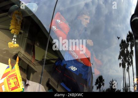 England cricket team's captain Joe Root is seen through the reflection on the front windshield glass after getting in to the bus following the the 2nd practice cricket match between Sri Lanka's Board President's XI and England cricket team at P Sara Oval was canceled on March 13, 2020 in Colombo, Sri Lanka. England cricket team's tour of Sri Lanka was officially called off due to the global spread of the coronavirus. The decision was announced by the England and Wales Cricket Board and their Sri Lankan counterparts on Friday morning while Joe Root’s players were out in the middle playing the s Stock Photo