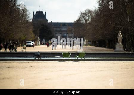 Jardin des tuileries is very quiet in Paris, France, on March 13, 2020. The day after the President 's intervention on Television about Coronavirus,in Paris, there is no traffic on the usual busy streets, busy places,as place de la Concorde,which was almost empty of cars, of people.Parisians are starting to wear face mask,as the tourists do ,in tourist places, on the streets, in subway, even in their car.some Museum are starting to close as the orsay museum, the louvre museum was quiet as ever. (Photo by Jerome Gilles/NurPhoto) Stock Photo