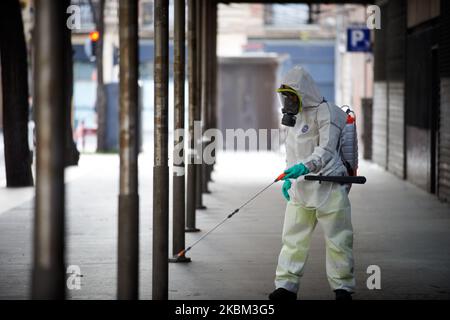 Toulouse has begun to disinfect its streets and urban furniture to stem the propagation of the coronavirus SRAS-COV-2, responsible of the Covid-19 disease. Cleaning worker use diluted bleach to spay. They wear protectice suits and gloves and a face mask. More than 180 places will be disinfected in the next few days. In France, to date, the SARS-COV-2 virus has killed more than 8000 people. Toulouse. France. April 7th 2020. (Photo by Alain Pitton/NurPhoto) Stock Photo