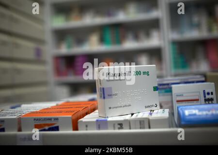 A box of Plaquenil, an anti-malaria drug hydroxychloroquine made by Sanofi, used for years to treat malaria and autoimmune disorders. In France, Pr Raoult and in the USA, President Trump, advocate the use of hydroxychloroquine (or chloroquine) to treat the Covid-19 disease en acute cases. To date, no clinic trials have demonstrated a real effect on the SARS-COV-2 virus. In the USA, orders for hydroxychloroquine jumped to around 1.8 million tablets per day in late March, up from an average of around 40,000 tablets per day in late January. In France, to date, the SARS-COV-2 virus has killed more Stock Photo