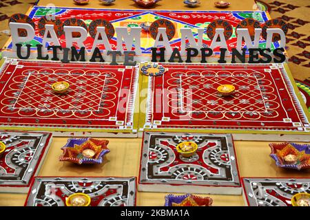 Diyas (lamps) are displayed at the BAPS Shri Swaminarayan Temple during the Annakut Darshan (also known as Annakut Utsav and Govardhan Puja) which takes place on fifth and final day of the festival of Diwali, which marks the start of the Hindu New Year, in Toronto, Ontario, Canada on October 28, 2019. Annakut which means a 'large mountain of food' which is offered to God as a sign of devotion. BAPS (Bochasanwasi Shri Akshar Purushottam Swaminarayan Sanstha) is a sect of Hinduism's Diksha Vidhi and their temples, though dedicated to many Hindu deities, also operate as community and learning cen Stock Photo