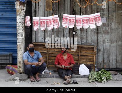 Vendor selling Assamese Traditional Gamosa as Assamese people celebrating Rongali Bihu, during the nationwide lockdown to curb the spread of coronavirus, in Guwahati, Assam, India on Monday, April 13, 2020. (Photo by David Talukdar/NurPhoto) Stock Photo