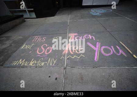A view of tributes drawn in the pavement in front of NYU Langone Hospital Center in New York City USA during coronavirus pandemic on April 14, 2020. (Photo by John Nacion/NurPhoto) Stock Photo