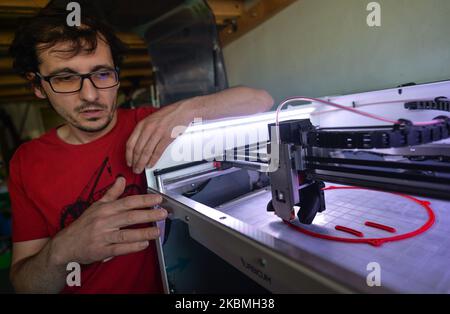 Szymon Chrupczalski, the VentilAid project coordinator explains how a 3D printer makes the VentilAid Prototype III respirator, a device that can be manufactured cheaply and with widely available parts using a 3D printer. The project was created by Urbicum, a Krakow based company specializing in 3D printing. The first two versions were developed and made available for free on the Internet. VentilAid Prototype III is a device for non-invasive ventilation, operating in CEPAP and BiPAP mode with an oxygen supply and meets the requirements of modern medical standards. It allows to keep patients in  Stock Photo