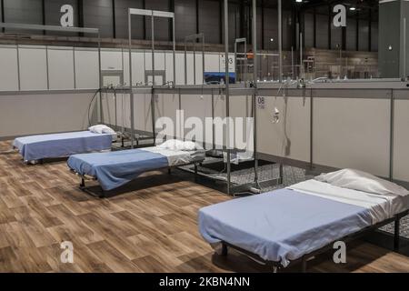 Interior of the IFEMA field hospital during its last day of operation due to the drop in healthcare pressure. The general director of Ifema, Eduardo Lopez-Puertas, has indicated that, despite the closure of the hospital, the facilities of the wards will remain "exactly the same" during the next month. "We will continue to maintain the beds and equipment in May in case there is any upturn" on April 30, 2020 in Madrid, Spain. (Photo by Oscar Gonzalez/NurPhoto) Stock Photo
