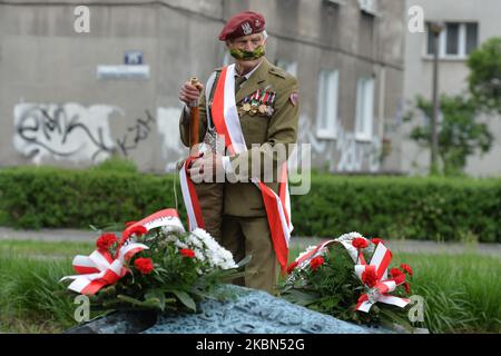 Major Jan Stachow (born in 1929), a former soldier and still active amateur athlete arrives at Daszynski Avenue to celebrate May Day outside the Monument to the Military Actions of the Proletariat in Krakow. On Friday, May 1, 2020, in Krakow, Poland. (Photo by Artur Widak/NurPhoto) Stock Photo