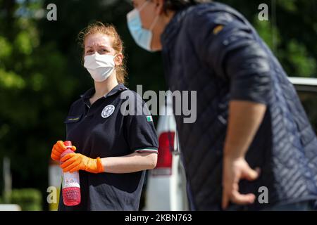 A Factory in Correggio donates alcohol bottles to be distributed by Red Cross and Civil Protection during COVID-19 pandemic in Italy on May 2, 2020 in Correggio, Italy. (Photo by Emmanuele Ciancaglini/NurPhoto) Stock Photo