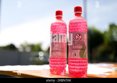 A Factory in Correggio donates alcohol bottles to be distributed by Red Cross and Civil Protection during COVID-19 pandemic in Italy on May 2, 2020 in Correggio, Italy. (Photo by Emmanuele Ciancaglini/NurPhoto) Stock Photo