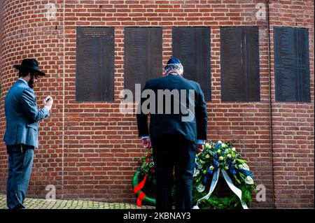 Rabbi M. Levin and Mayor of Nijmegen Hubert Bruls,who is also the chairman of the Security Council in the country, are holding the ceremony at the 'Kitty de Wijze', a monument that it has become the symbol of the Jewish in Nijmegen, during the Remembrance day, on May 4th, 2020. (Photo by Romy Arroyo Fernandez/NurPhoto) Stock Photo