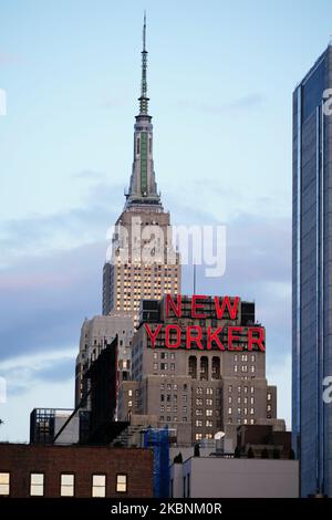 A view of the Empire State Building and the New Yorker Hotel on the foreground during the coronavirus pandemic on May 11, 2020 in New York City. COVID-19 has spread to most countries around the world, claiming over 270,000 lives with over 3.9 million infections reported. (Photo by John Nacion/NurPhoto) Stock Photo