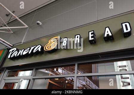 A view of people outside Panera Bread during the coronavirus pandemic on May 12, 2020 in Queens borough of New York City. COVID-19 has spread to most countries around the world, claiming over 270,000 lives with over 3.9 million infections reported. (Photo by John Nacion/NurPhoto)