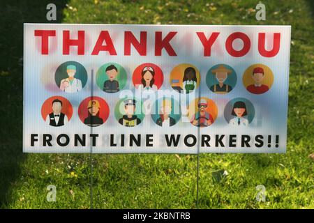 Sign thanking frontline workers for all they have done during the novel coronavirus (COVID-19) pandemic in Toronto, Ontario, Canada on May 13, 2020. (Photo by Creative Touch Imaging Ltd./NurPhoto) Stock Photo