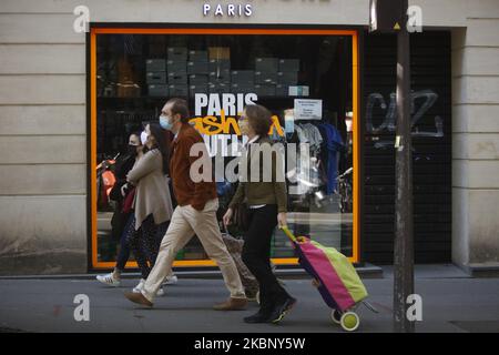 people walk in the street in Paris on May 17, 2020, on the seventh day of a partial lifting of a near two month lockdown imposed in France to stop the spread of the pandemic caused by the new coronavirus (COVID-19). (Photo by Mehdi Taamallah/NurPhoto) Stock Photo