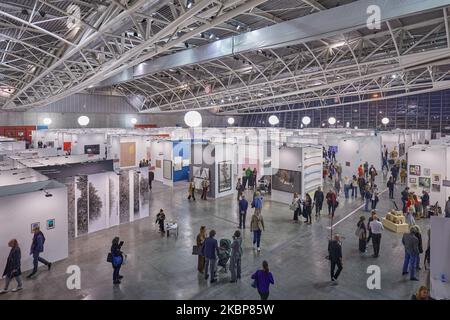 TURIN, ITALY - NOVEMBER 03, 2022: Artissima 2022, people and art collectors at contemporary art fair vernissage Stock Photo