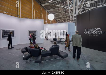 TURIN, ITALY - NOVEMBER 03, 2022: Artissima 2022, Gregory Crewdson exhibition with people and art collectors at contemporary art fair vernissage Stock Photo