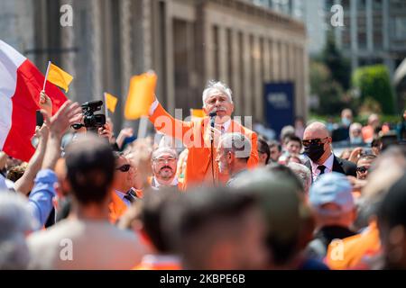 The leader Antonio Pappalardo arrives at the “Gilet Arancioni” protest in Piazza Duomo with orange vest during the Phase 2 of Coronavirus (COVID-19) National Lockdown on May 30, 2020 in Milan, Italy. (Photo by Alessandro Bremec/NurPhoto) Stock Photo