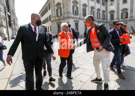 The leader Antonio Pappalardo arrives at the ''Gilet Arancioni'' protest in Piazza Duomo with orange vest during the Phase 2 of Coronavirus (COVID-19) National Lockdown on May 30, 2020 in Milan, Italy. During the demonstration, the social distances and the mask foreseen by the Covid-19 emergency were not respected. (Photo by Mairo Cinquetti/NurPhoto) Stock Photo