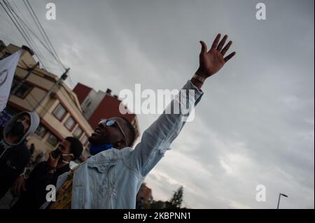 People take part in a demonstration in Bogota, Colombia, on June 3, 2020 in front of US Embassy to protest against the murder of George Floyd in the United States and for the Murder of Anderson Arboleda in Cauca, Colombia, both african americans killed by police. (Photo by Sebastian Barros/NurPhoto) Stock Photo