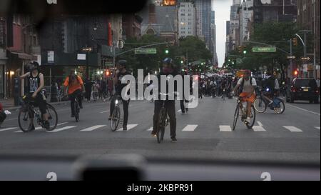 Protests go on in the street as bike scouts secure the street to make the protesters feel safe from oncoming cars In Manhattan, US, on June 3, 2020. (Photo by Shay Horse/NurPhoto) Stock Photo