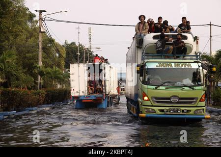 Residents Ride In Trucks To Crossing The Flood Water Cause By Rob As ...