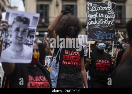 People protest in memory of George Floyd, black lives and against racism in Barcelona, Spain, on June 7, 2020 called by the CNAAE (Black African and Afro-descendant Community in Spain). This has been one of the many protests today in many cities in Spain. (Photo by Robert Bonet/NurPhoto) Stock Photo