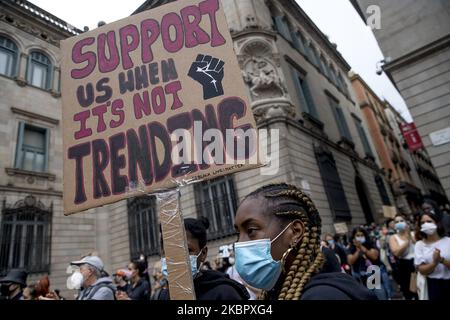 Thousands of people demonstrate in Barcelona's Plaça de Sant Jaume against racism and in memory of George Floyd in Barcelona, Catalonia, Spain on June 7, 2020. (Photo by Albert Llop/NurPhoto) Stock Photo