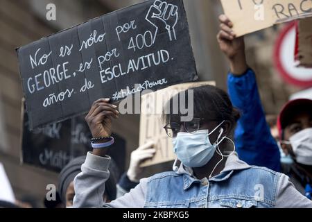 Thousands of people demonstrate in Barcelona's Plaça de Sant Jaume against racism and in memory of George Floyd in Barcelona, Catalonia, Spain on June 7, 2020. (Photo by Albert Llop/NurPhoto) Stock Photo