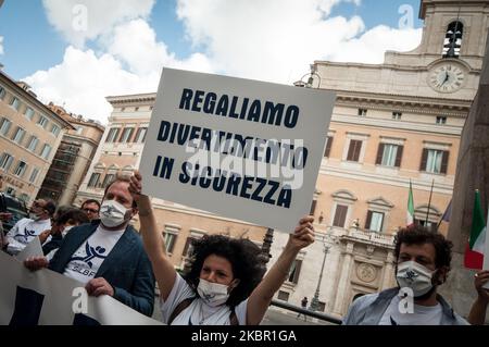 Silb Fipe, a trade association of discos, demonstrated in front of Montecitorio, Rome, Italy, on June 10, 2020 with a Flash Mob of the managers of the discos 'Silence makes noise', to ask the Government to resume activities in the clubs. (Photo by Andrea Ronchini/NurPhoto) Stock Photo