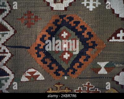 Traditional Turkish motifs on a carpet. Geometric or abstract patterns on the Turkish carpet. Stock Photo