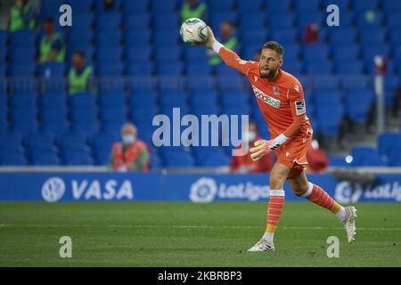 Alex Remiro of Real Sociedad does passed during the Liga match between Real Sociedad and CA Osasuna at Estadio Anoeta on June 14, 2020 in San Sebastian, Spain. (Photo by Jose Breton/Pics Action/NurPhoto) Stock Photo