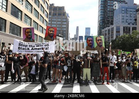 People march across the city, and pass near the African Burial Ground National Monument, on the 155th anniversary of Juneteenth in New York City ,US, June 19, 2020. The oldest nationally celebrated commemoration of the end of slavery dating to June 19, 1865. On that date, Union Soldiers arrived in Galveston Texas and announced the end of the Civil War and that all slaves are free according to federal law. (Photo by John Lamparski/NurPhoto) Stock Photo